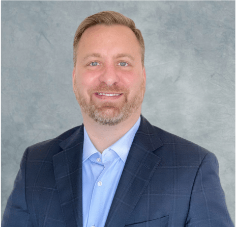 Interview with Brian J. Gallagher, COO of ProtectedBy.AI 1 Brian Grey Background Headshot.png